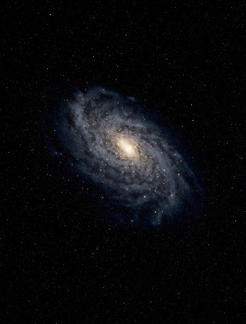 A white spiral arm galaxy against a dark starry background